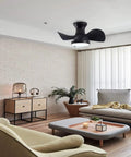 22" Modern Small Ceiling Fan with Light, Matte Black Reversible Energy Saving Silent DC Ceiling Fan Remote Controlled in living space.