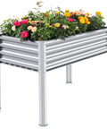 Galvanized Raised Garden Bed With Legs 48 By 24 By 32 Inch Elevated Planter Box With Drainage Holes Easy Assembly Heavy Duty 700 Lb Capacity For Backyard Patio Balcony Weather Resistant filled with flowers