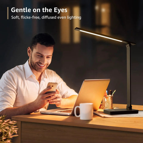 Man using Awesome LED Desk Lamp For Home Office With Five Color Modes And Five Brightness Levels For Twenty Five Lighting Settings