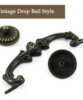 Close-up of Oil Rubbed Bronze 6 Pack Drawer Pulls With Vintage Drop Bail Handles 5 Inch Hole Centers Cabinet Hardware pieces