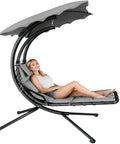 Woman lounging on Chaise Lounger Swing Chair With Umbrella Canopy For Outdoor Patio And Indoor Use Hanging Lounge With Stand