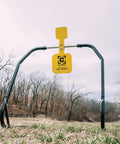 AR500 Dual Spinner Target For Rifle Shooting Three Eighths Inch Steel Target On A Collapsible Stand in an outdoor setting