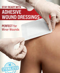 Person applying adhesive wound dressing for minor cuts on shoulder, featuring sterilized mark