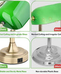 Comparison of green glass bankers lamp with brass base and USB ports to lower quality alternatives, focus on materials and build.