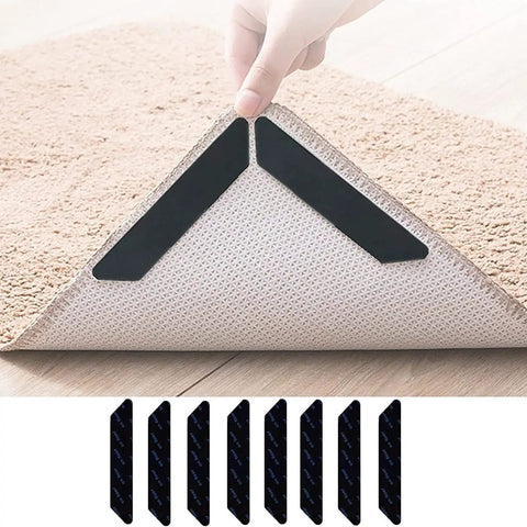 No Slip Carpet Gripper Kit 16 Pack used on rug corner showcasing edge clips and adhesive tape holding mat to wooden floor