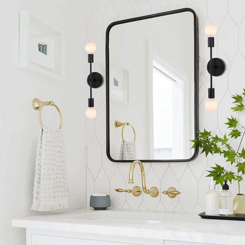 Dual Light Bathroom Wall Sconce Vanity Fixture In Gold And Black Finish beside mirror in modern bathroom decor