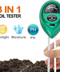 Three In One Soil Test Kit With Moisture Sunlight And PH Meter held over soil for indoor and outdoor gardens plants lawns and farms