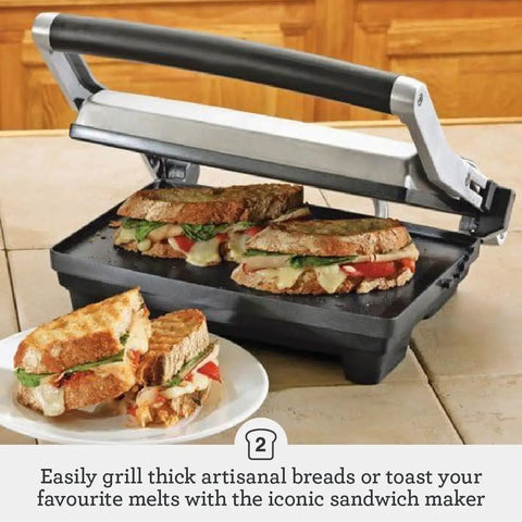 Brushed Stainless Steel Panini Maker With Dual Independent Heating Zones For Even Grilling And Toasting, grilling sandwiches.