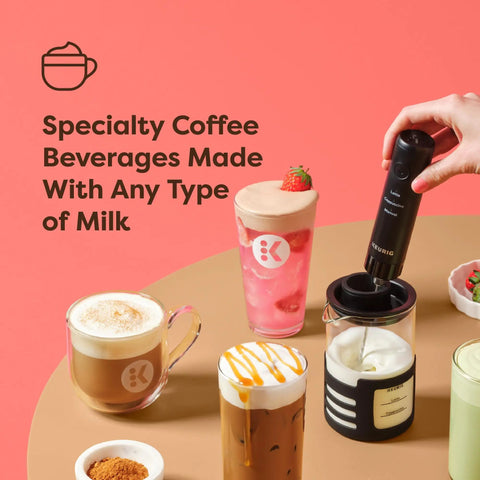 SimpleCafe Rechargeable Handheld Milk Frother For Lattes Cappuccinos And Iced Coffee USB Cord Included Microwave Safe Frothing Cup Hot And Cold Foam Maker For Rich Silky Foam In Seconds being used to create specialty coffee beverages with a pink background.
