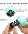 Inserting AAA batteries into teal LED camping light from Three Pack Portable LED Camping Lights With Three Modes High Low And Strobe Lightweight ABS Bulbs In Green Teal Pink Ideal For Kids Adventures Camping Emergencies Includes 3 AAA Batteries.
