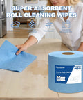 Hella Absorbent Heavy Duty Cleaning Cloths Jumbo Roll In Royal Blue used for cleaning spills on a countertop with durable 8x12 sheets.