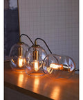 Dope Clear Art Glass Pendant Lights 2 Pack For Kitchen Island And Dining Room Table Modern Organic Globe Ceiling Fixture with gold hardware