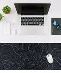 Large Topographic Gaming Mouse Pad 31.5 By 11.8 Inches With Smooth Surface Grippy Non Slip Base And Stitched Edge Extended Desk Pad XL Desk Mat For Gaming And Work Black on modern desk setup