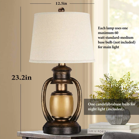 Rustic Lantern Table Lamp For Living Room And Bedroom End Table With Oatmeal Tapered Drum Shade next to potted plant