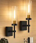 Plug And Play Wireless Wall Sconces With Smart Remote Control And Massive 10000Mah Battery Dimmable Rechargeable Lighting Set Of Two sleek black and gold fixtures mounted on a wall.