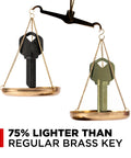 AirKey Aluminum Key Blanks 3 Pack For Kwikset Locks 75 Percent Lighter vs brass key on balance scale