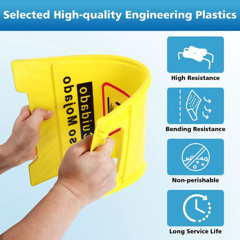 Hands holding the 2 Pack Caution Wet Floor Sign Bright Yellow 17.5 Inch Height Double Sided Foldable A Frame With English And Spanish.