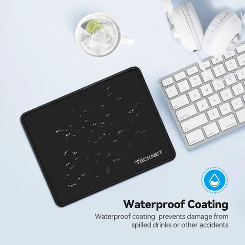 Ultra Smooth Gaming Mouse Pad With Dope Anti Fray Stitching Waterproof Surface And Non Slip Rubber Base Stitched Edges Works With Laser And Optical Mice Perfect For Laptop Setups shown on desk with clear glass and keyboard