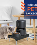 Hella Sturdy Raised Dog Feeder Stand And Elevated Cat Food Holder with adjustable legs and non-slip feet by a cat.