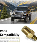 Badass Heavy Duty Brass Bleeder Screws Eight Piece Brake Caliper Kit With 1 8 27 And 1 4 28 Threads Road Ready copper bleeder screw next to a Jeep on a mountain road.