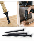Your New Go To Weekend Warrior Screw Assortment Kit With 170 Phillips Flat Head Black Wood Screws Multi Size For Furniture Assembly And Gotta Get It Done Fixes featuring screws in use and displayed neatly.