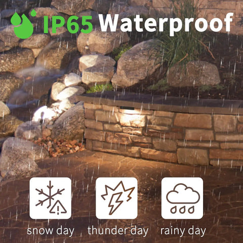 4-Pack 7-Inch LED Rotatable Retaining Wall Lights With 7-Color Hardscape Lighting Outdoor Step Lights in rain showing IP65 waterproof feature