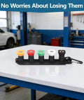 Beefy Pressure Washer Gun And Hose Kit with 5 nozzle colors on a table in a workshop setting.