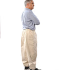 Man wearing Beekeeping Pants For Full Lower Body Protection From Bees And Wasps Heavy Duty Beekeeper Workwear With Reinforced Knees