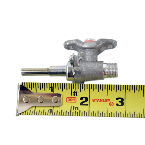 Genuine OEM Surface Burner Valve Replacement Part For Samsung Range Stove And Oven Gas Control Valve next to tape measure showing size.