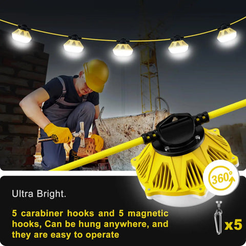 Rugged 50 Ft LED Construction String Lights With 5 Sockets 100W illuminating a job site, featuring aluminum housing and carabiner hooks