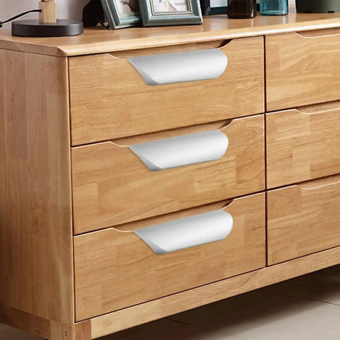 Wooden dresser with 5 Pack Adhesive Edge Finger Pulls For Cabinets And Kitchen, 3.15 Inch No Drill Aluminum Drawer Pulls, silver finish