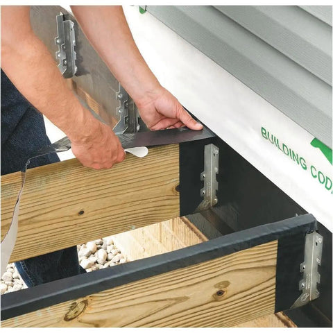Installer applying Peel and Seal Self Stick Roll Roofing Aluminum 36 Inch Wide Durable Self Adhesive Roofing Material For Quick Patches