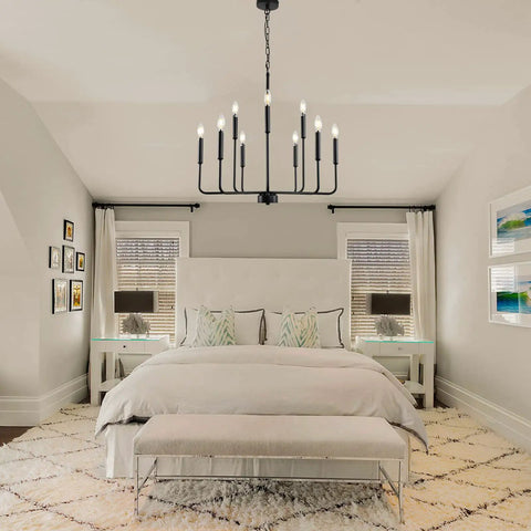 Black Farmhouse Chandelier For Dining Room Over Table Nine Light Industrial Metal Candle Lighting Fixture in a cozy bedroom