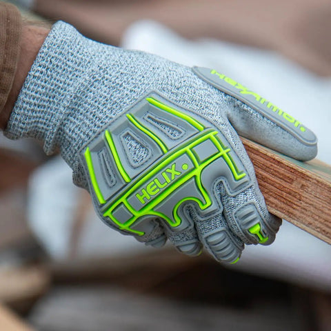 Impact Protection Safety Gloves With Polyurethane Palm Coating A4 Cut Level 13 Gauge Seamless Knit Touchscreen Compatible Helix 1074IMP Large Size Durable Grip For All Day Work shown gripping wood