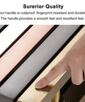 Close-up of gold finish industrial sliding glass door handle with finger pressing, showing smooth and durable surface.