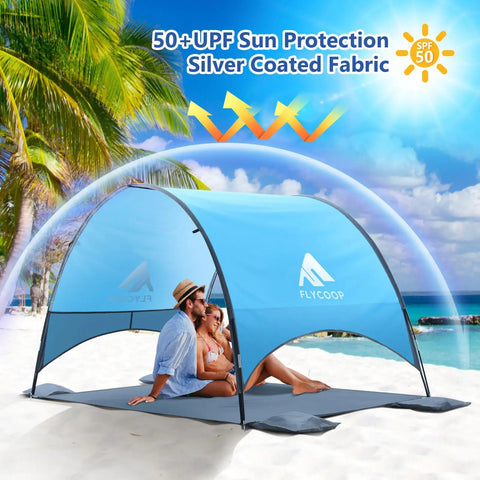UPF 50 Plus Beach Tent Canopy With 360 Degree Ventilation Portable Sun Shade For The Fam on sandy beach with couple