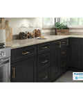 Kitchen with black cabinets featuring Champagne Bronze Cabinet Handles 5 Pack, 4 Inch Center To Center Drawer Pulls.