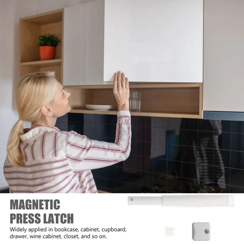 Upgrade Your Cupboards With These Durable White Plastic Rebounders For Easy Push To Open, shows a woman using a cabinet door catch.