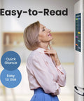 Woman using Air Fryer Cheat Sheet Magnet Set For Quick Times And Temperatures A Magnetic Guide For 100 Plus Foods on fridge