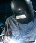 100 Pack Premium Glass Welding Helmet Lenses With Crystal Clear View For Cutting And Grinding in use during welding, sparks flying.
