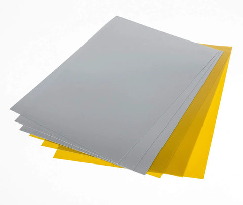 Hella Dope Metallic Shrink Film Gold Silver Opaque 8 By 11 Inches For Crafting Jewelry Pendants Gift Tags And Ornament Projects Super Easy To Cut Oven Bake And Shape Into Custom Charms Pack Of Six, showing metallic silver and gold sheets stacked.