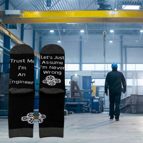 Two Pairs Funny Engineer Socks Gift Set For Men And Women Featuring Trust Me Im An Engineer Science And Engineering Theme Perfect Graduation Gift For Engineers And STEM Lovers, displayed with industrial background.