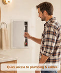 Man accessing plumbing through the Rock Solid 12 Inch Abs Plastic Hinged Access Panel Waterproof Wall Cover Door.