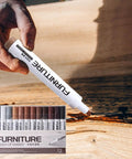 Person using 12 Color Furniture Scratch Repair Markers Kit with Wood Touch Up Stain Pen on wooden surface