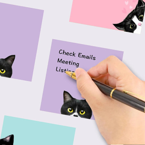 Hand writing on Nine Pad Cat Themed Sticky Notes Set In Pink With Super Adhesive Self Stick Notes, 3x3 Inch Memo Pads
