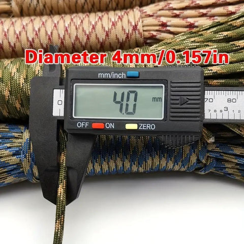 Beefy Heavy Duty Paracord Rope 164 Feet 9 Strand Tactical Utility Cord with caliper measuring 4mm diameter, desert camouflage