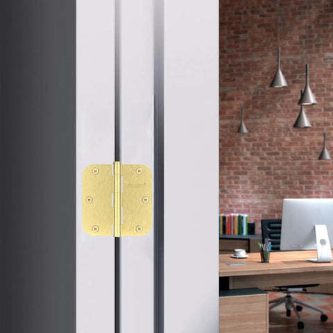 30 Pack Boss Level Brushed Gold Door Hinges 3.5 Inches on a door frame showcasing heavy duty brass steel construction.