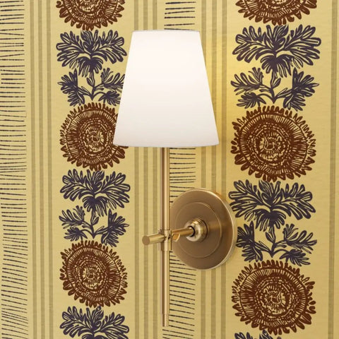 Drop Dead Gorgeous Rustic Stripes Gold Metallic Wallpaper With Hella Smooth Fibrous Texture And Top Tier Glam Finish on wall with elegant lamp.