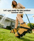 Woman wearing Durable Lawn Aerator Shoes with Adjustable Straps on a sunny day, boosting lawn health in a garden setting.