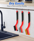Wire Brush Set 3 Piece Stainless Steel Brass Nylon Brushes With Curved Handle hanging over a sink drying